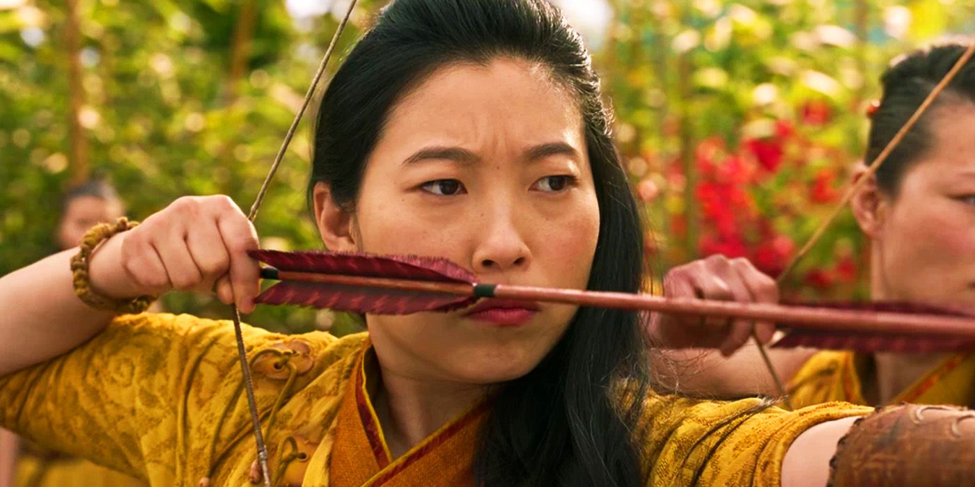 Katy learning archery in Ta Lo in Shang-Chi and the Legend of the Ten Rings