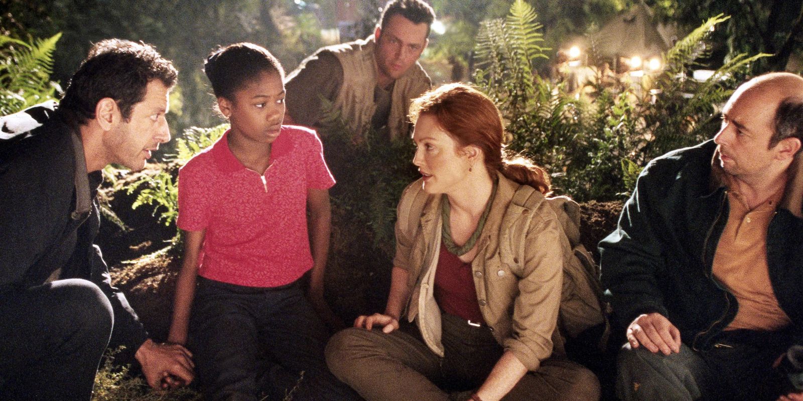 Kelly Malcolm talks with the others at the camp site in The Lost World