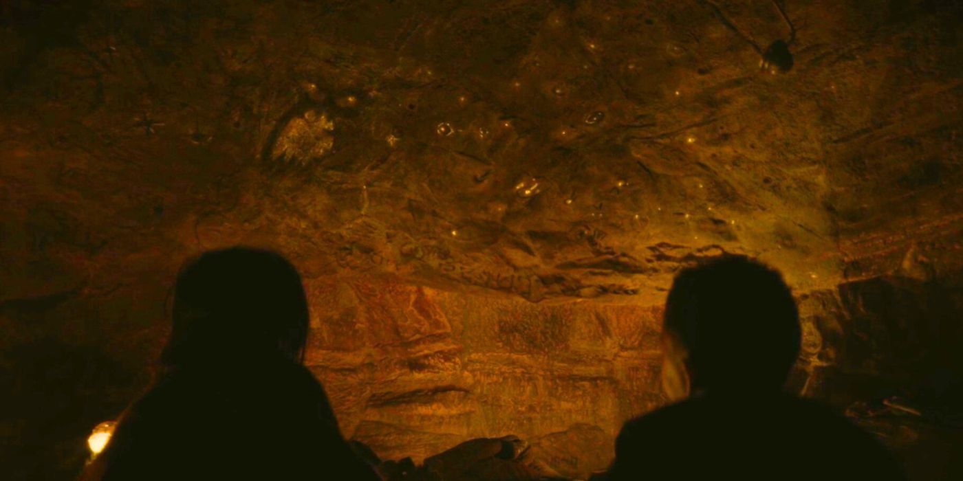 Kwan and Kessler look at the cave drawings in Halo season 2