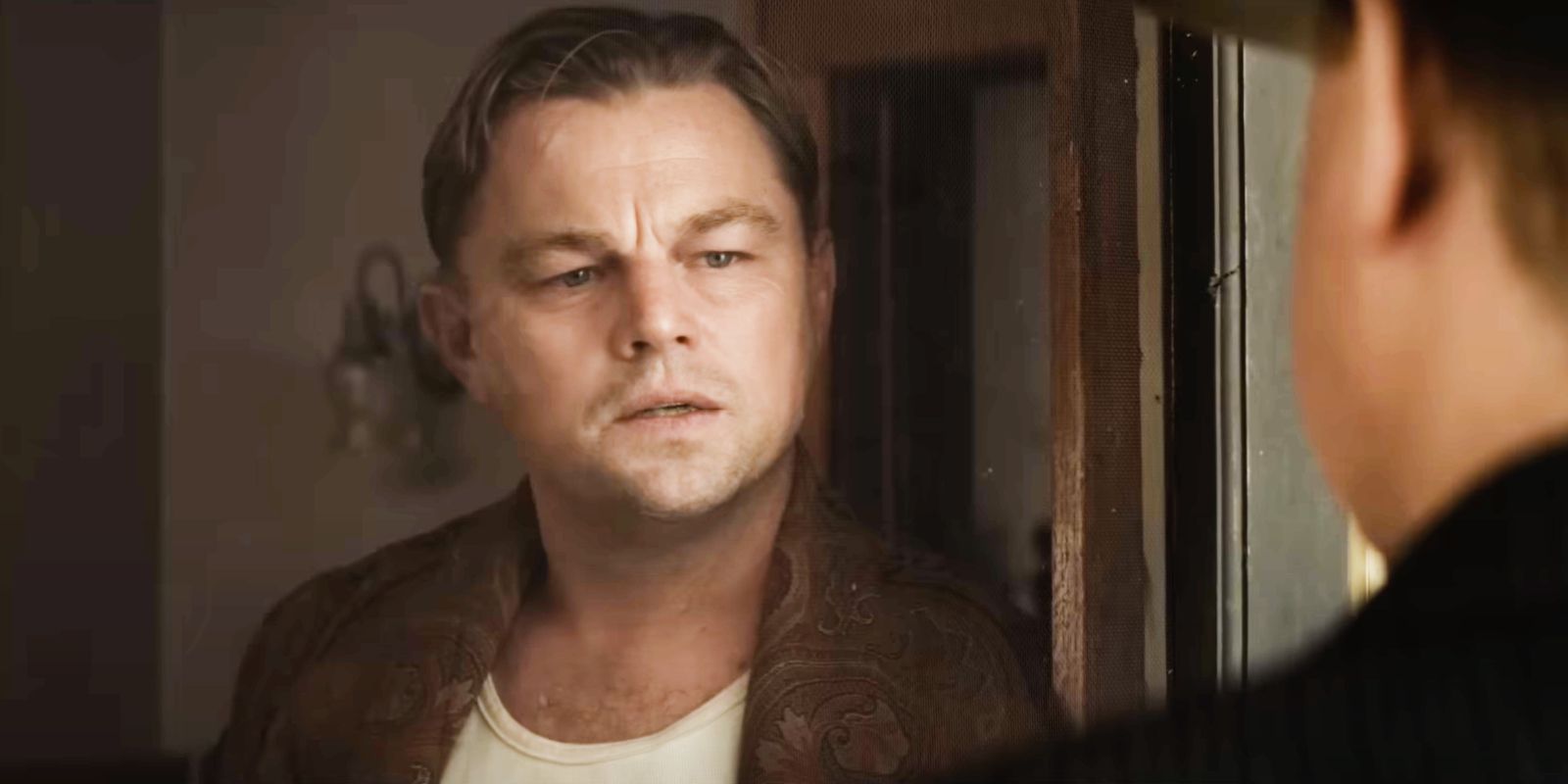 Leonardo DiCaprio's Ernest Burkhart with a dismayed look on his face in Killers of the Flower Moon