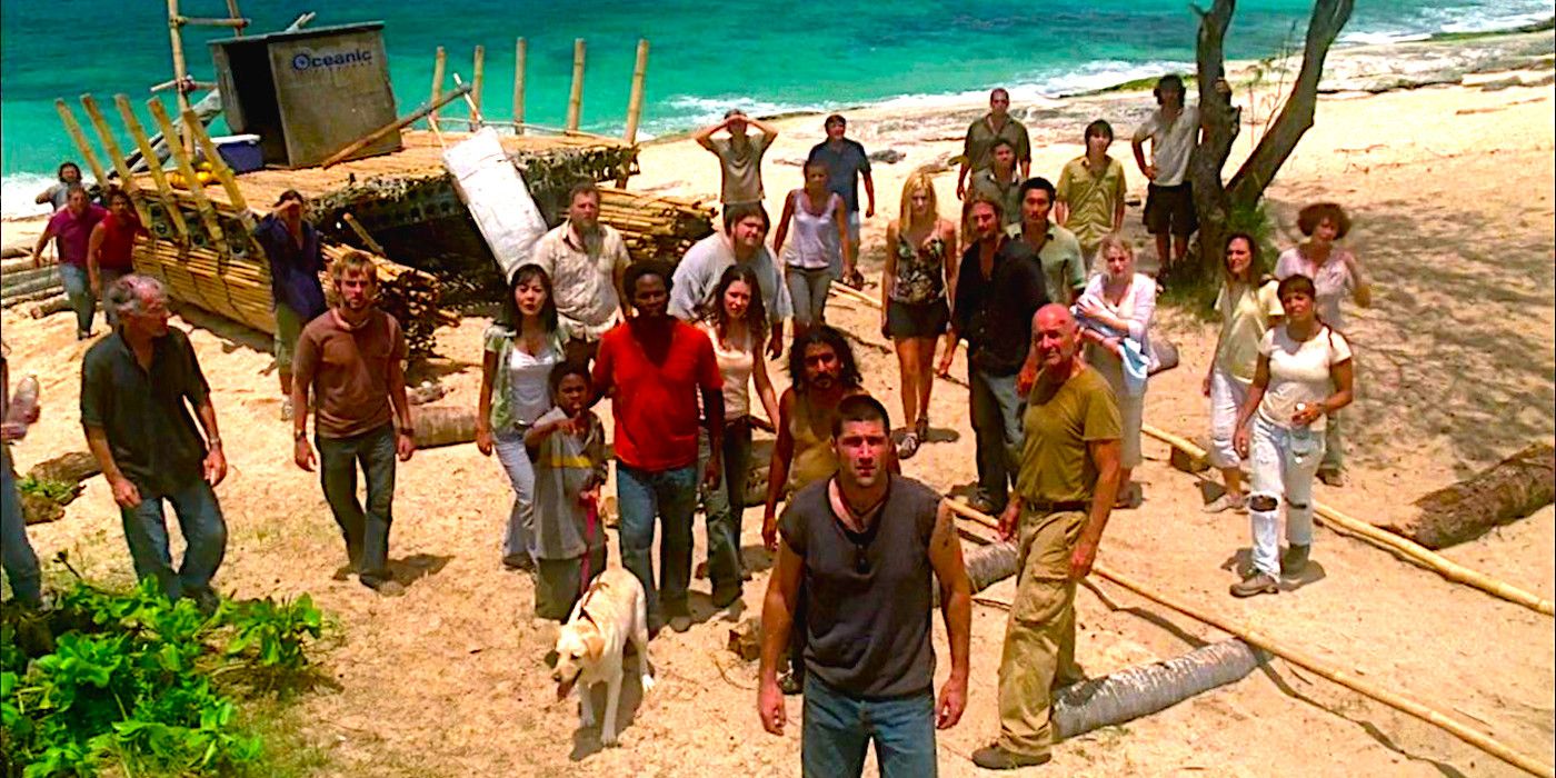 Main cast of Lost standing on the beach gazing up at something in interest