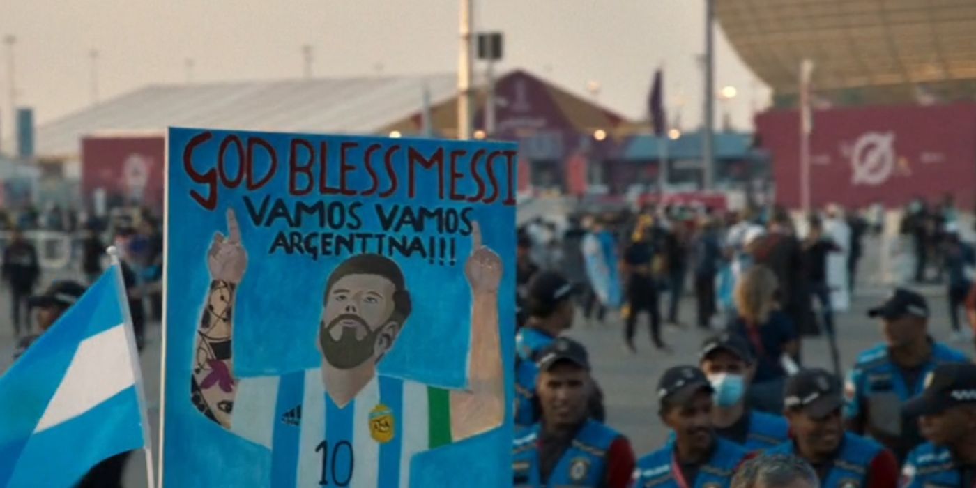 Argentinian fans with a Messi poster in Qatar