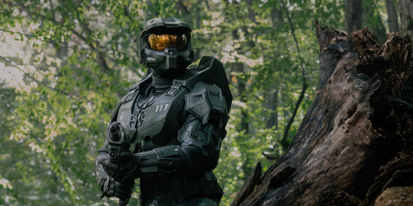 Master Chief (Pablo Schreiber) wields a weapon in the woods in Halo season 2
