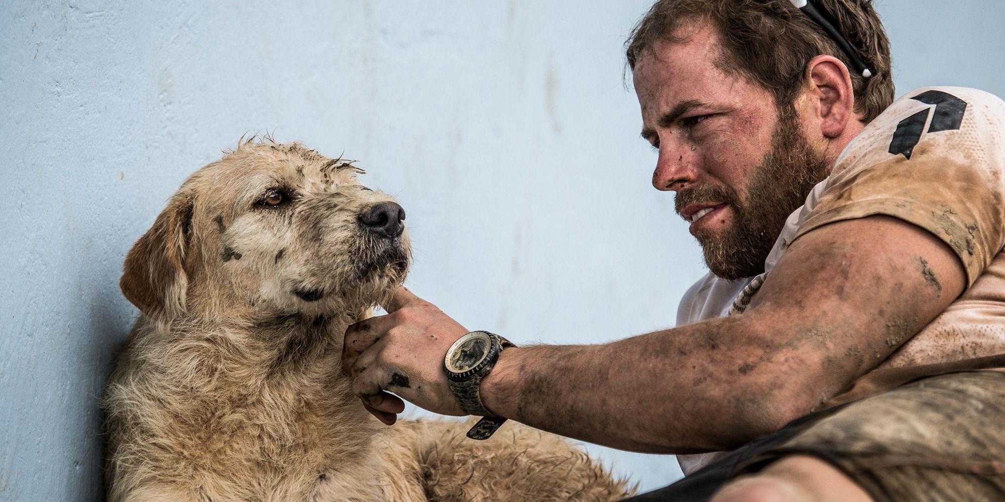Mikael Lindnord and the stray dog Arthur in Ecuador