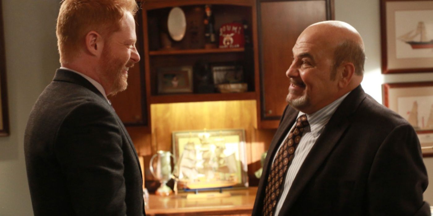 Jon Polito smiling with Mitch in Modern Family