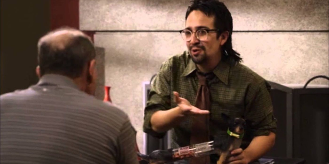 Guillermo (Lin-Manuel Miranda) with glasses and long hair in Modern Family