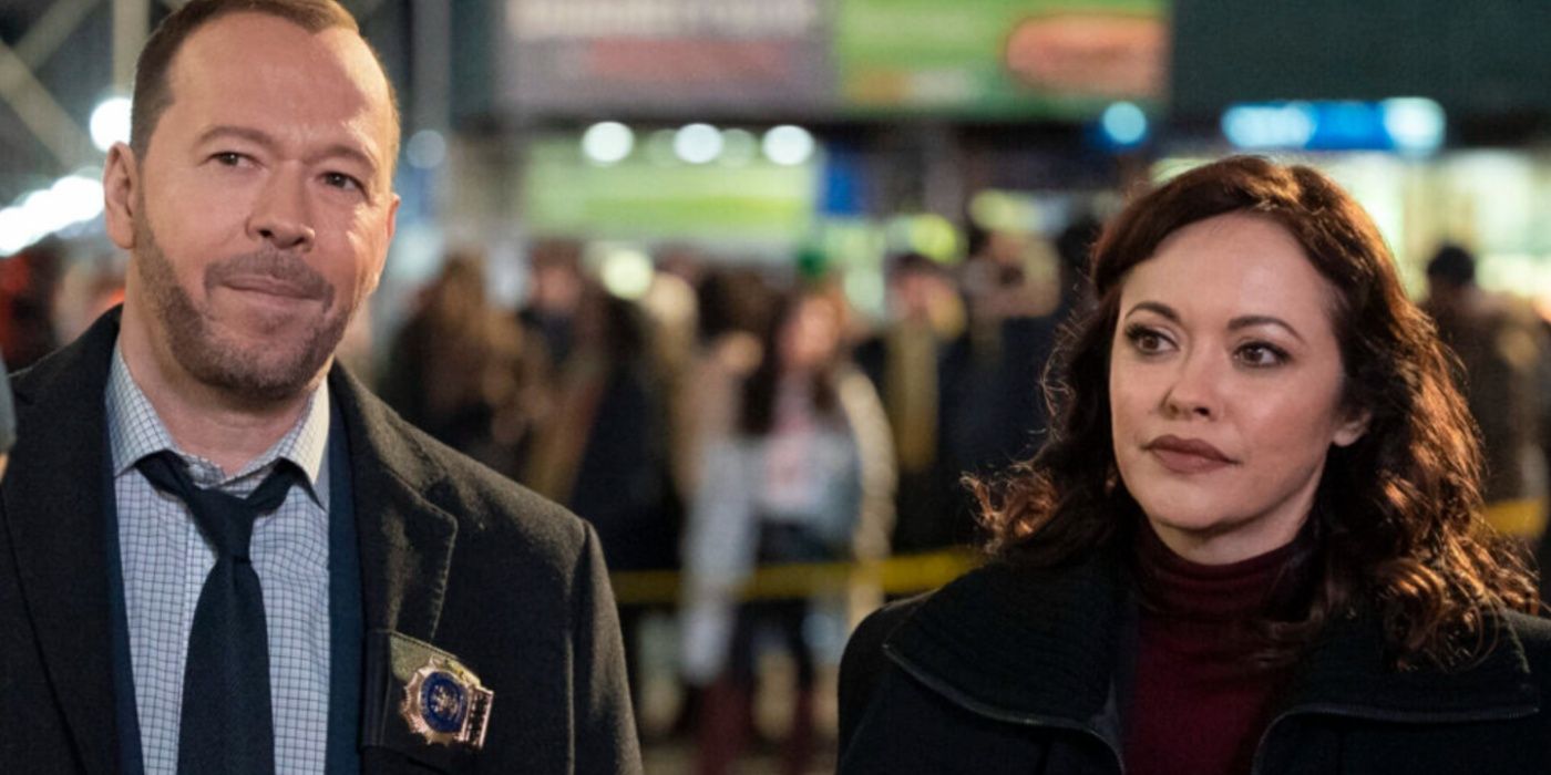 Danny (Donnie Wahlberg) and Baez (Marisa Ramirez) on the street in Blue Bloods