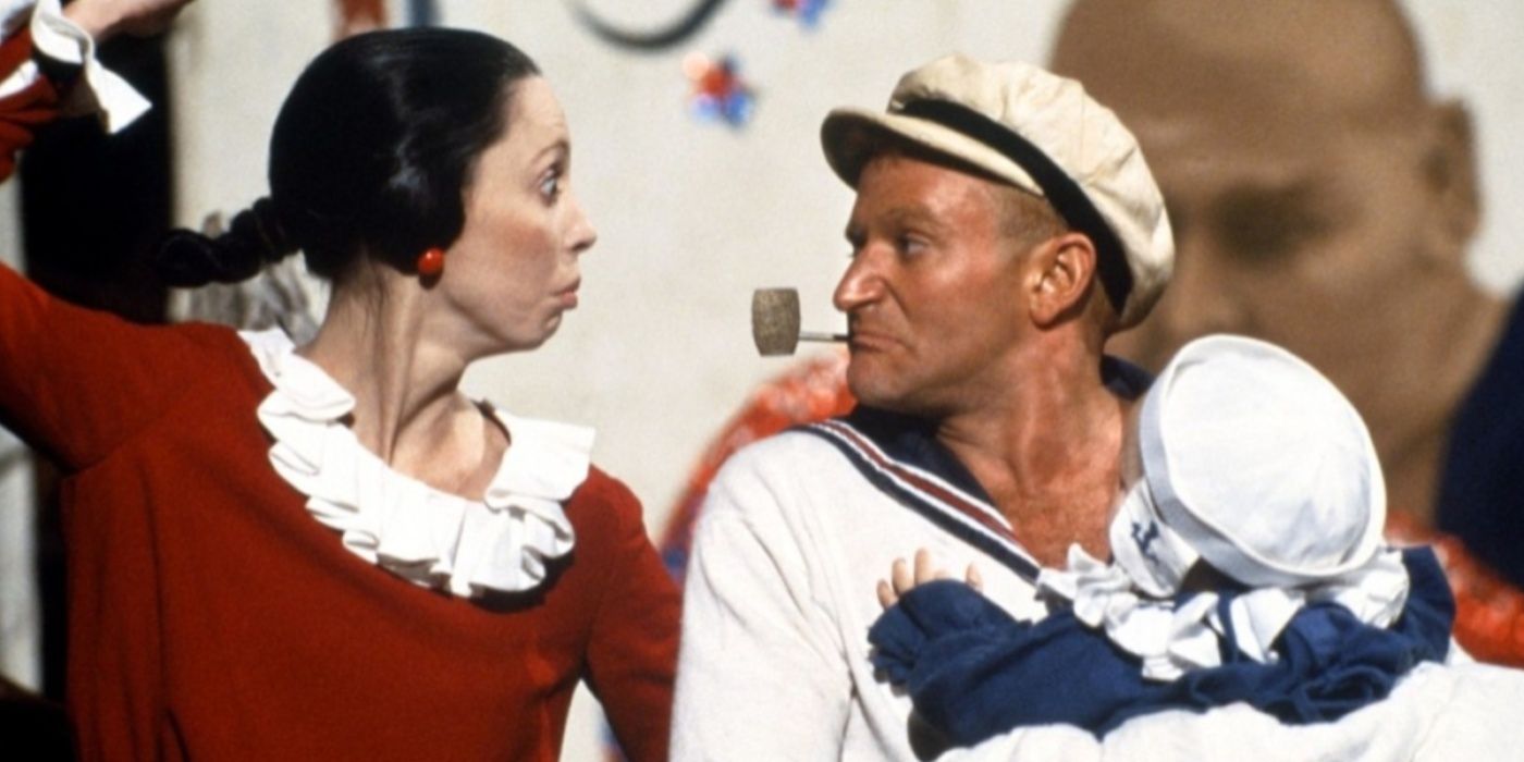 Popeye (Robin Williams) and Olive (Shelley Duvall) look at each other in Popeye
