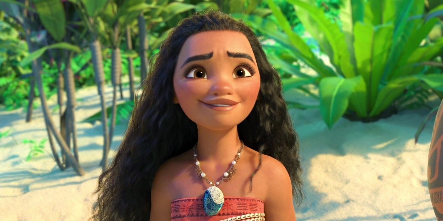 Moana smiling while looking at something off-screen in Moana (2016)