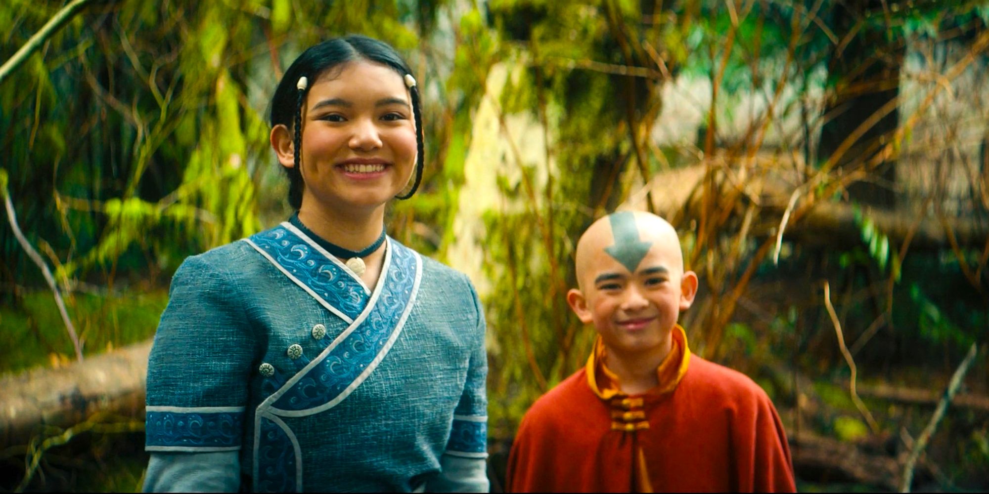 Katara and Aang looking happy from Avatar the last airbender looking happy Gordon Cormier as Aang Kiawentiio Tarbell as Katara