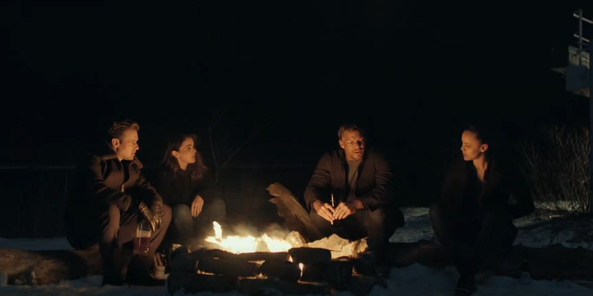O'Donnell, Dixon, Reacher, and Neagley sit around a camp fire in the final episode of Reacher season 2
