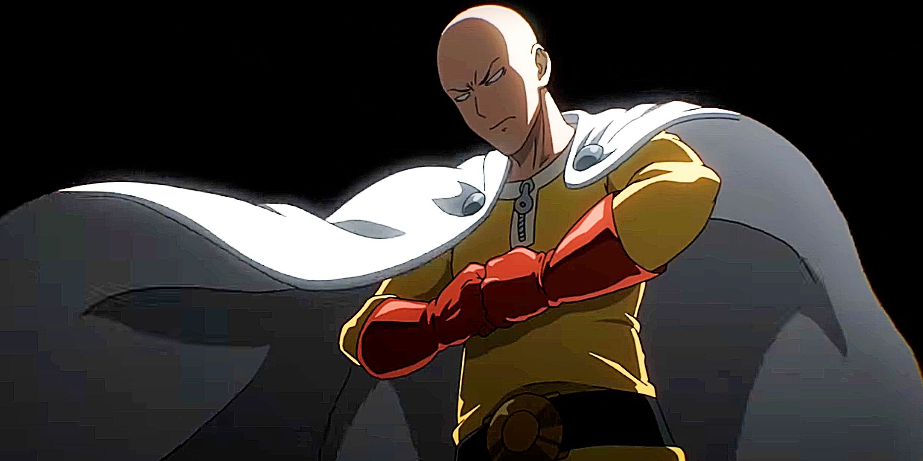 One-Punch Man prepares to fight with his fists together and a serious expression.