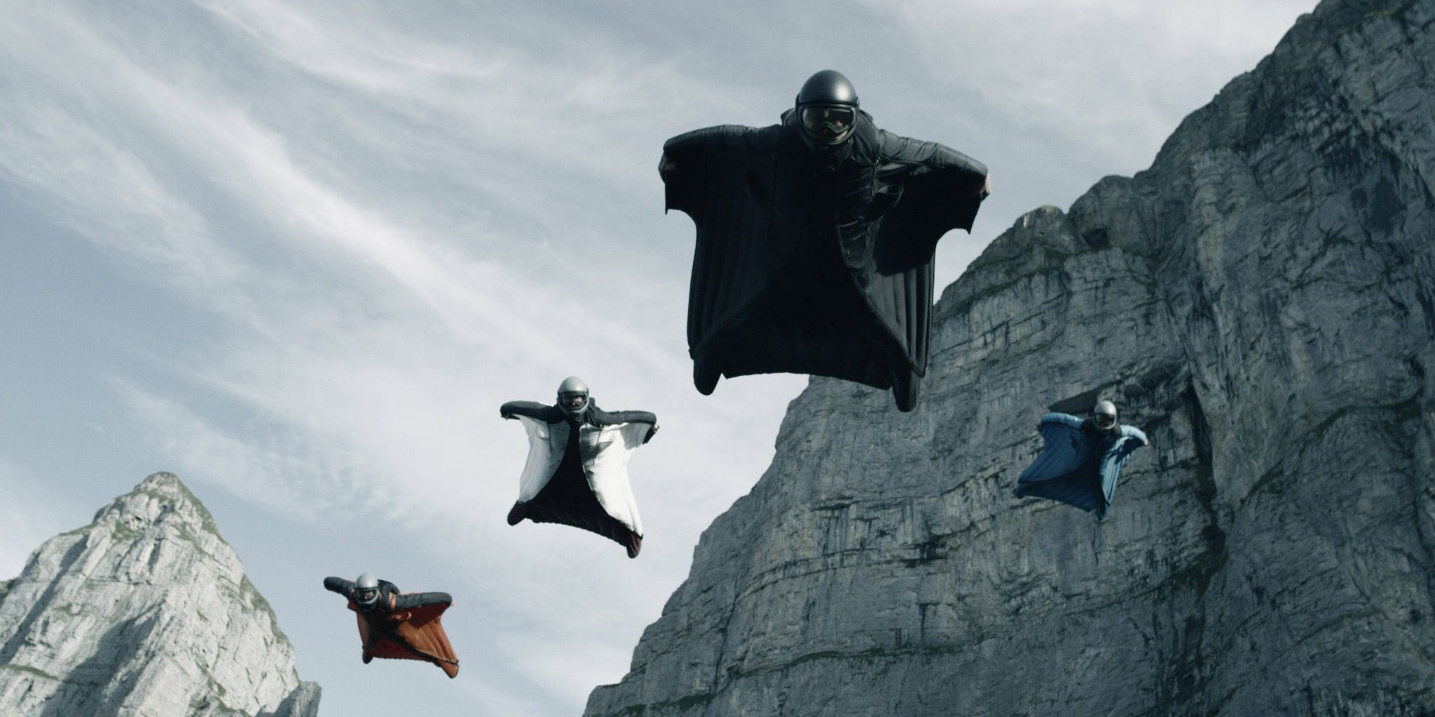The thieves going wingsuit diving in Point Break (2015).