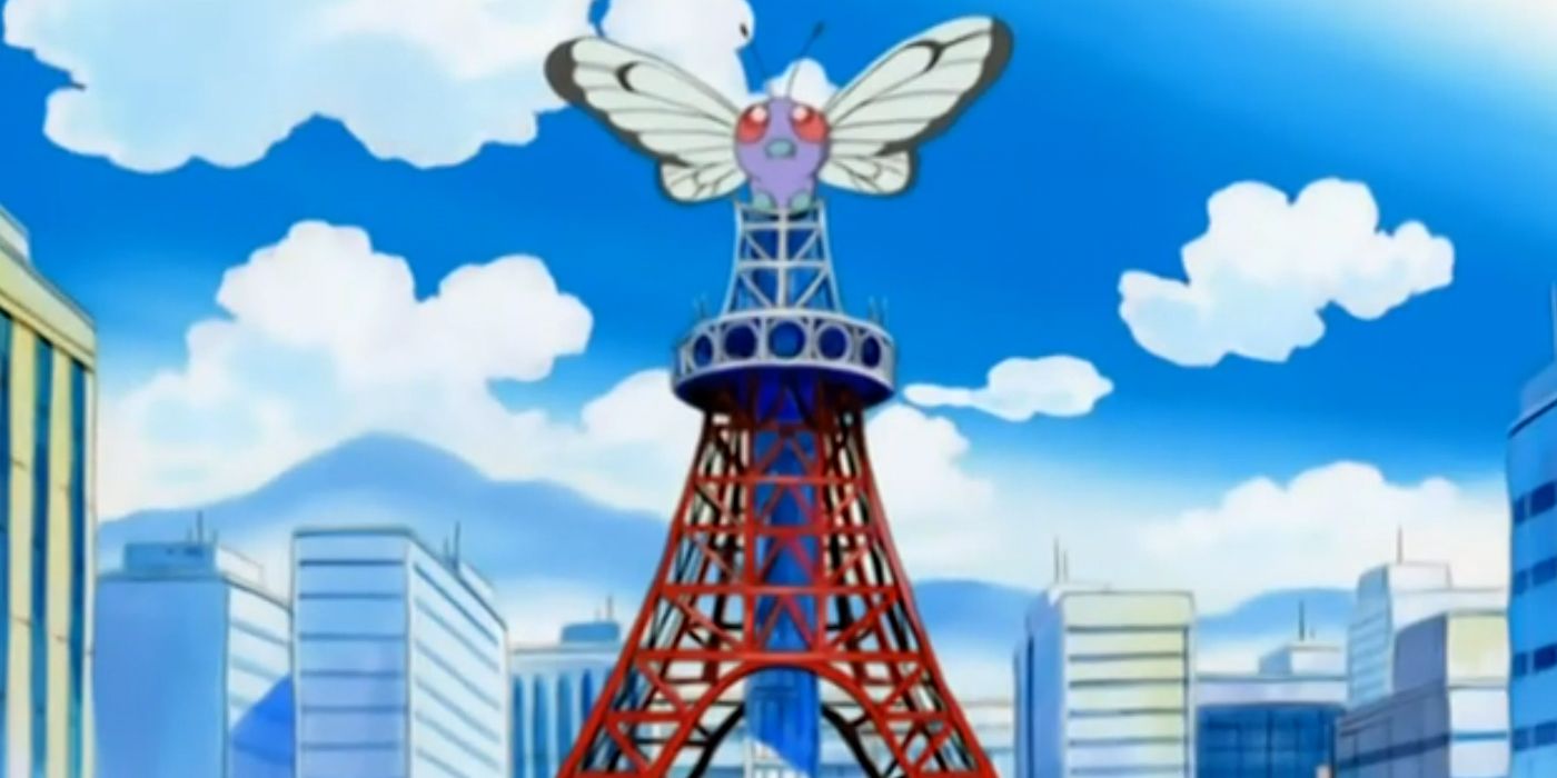 Pokémon: Giant Butterfree no topo de uma torre destruída.