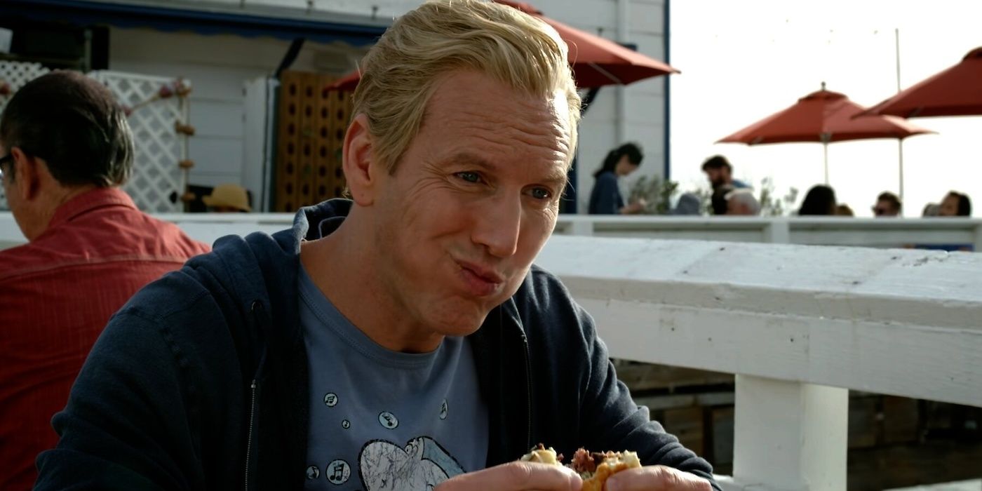 Patrick Wilson as Orm in Aquaman and the Lost Kingdom eating a burger