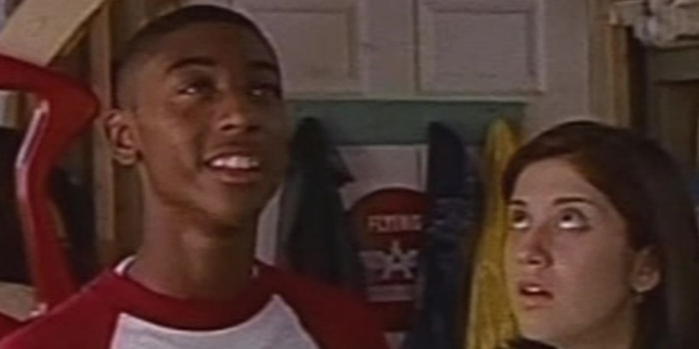 Ray (Darris Love) smiling with Annie (Meredith Bishop) rolling her eyes in The Secret World of Alex Mack.