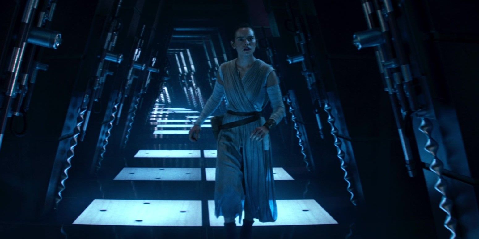 Rey having a vision after touching the Skywalker lightsaber in Star Wars: Episode VII - The Force Awakens