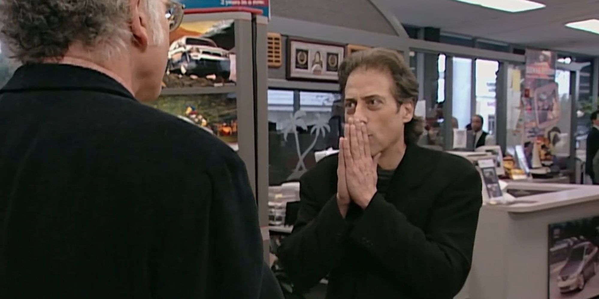 Richard confronts Larry at a car dealership in Curb Your Enthusiasm