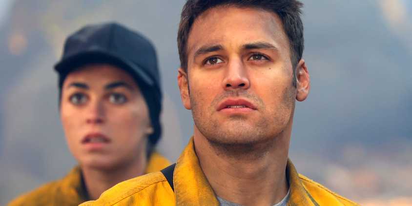 Ryan Guzman as Eddie Diaz looking at a disaster in 9-1-1's crossover episode with 9-1-1: Lone Star