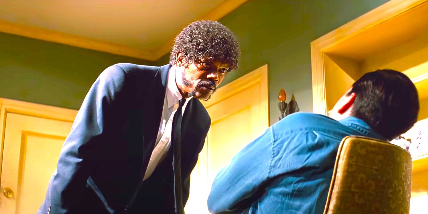 Samuel L. Jackson leaning in menacingly while interrogating Frank Whaley in a dramatic scene from Pulp Fiction