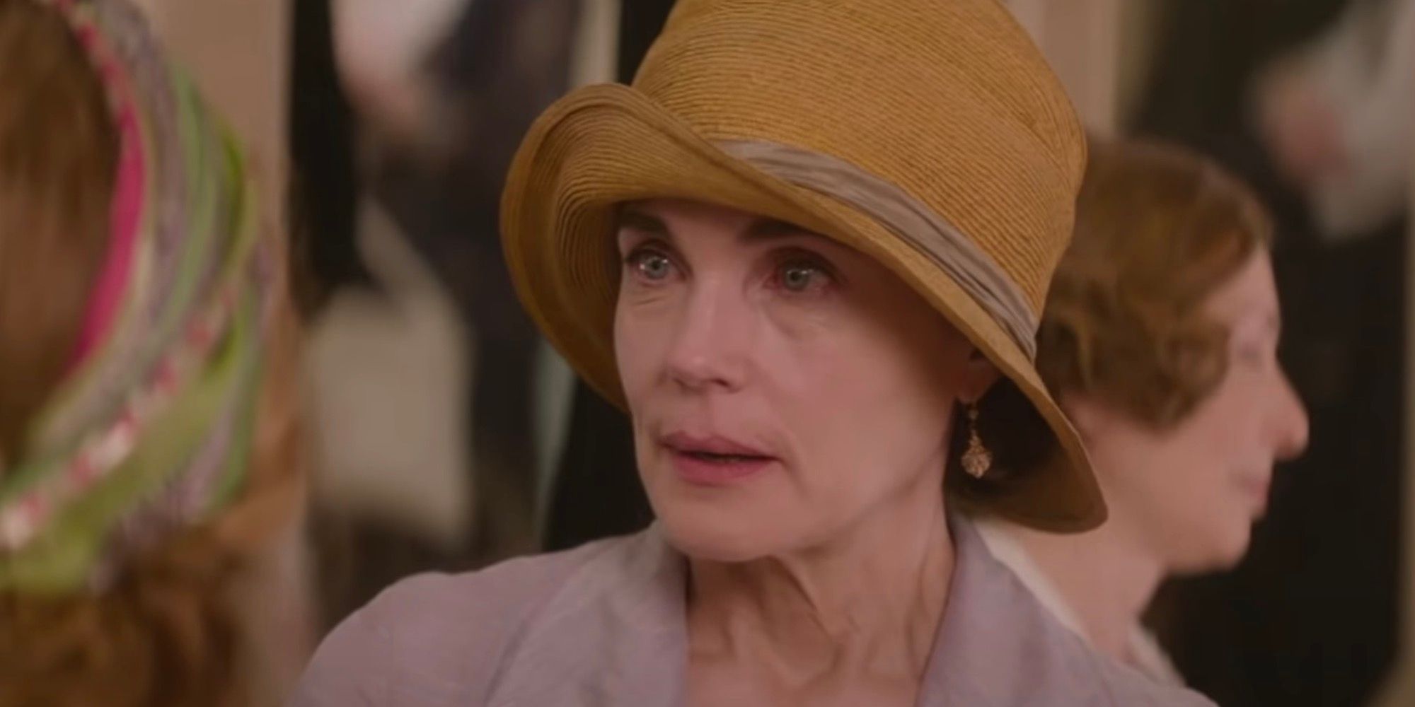 Norma holding back tears in The Chaperone.