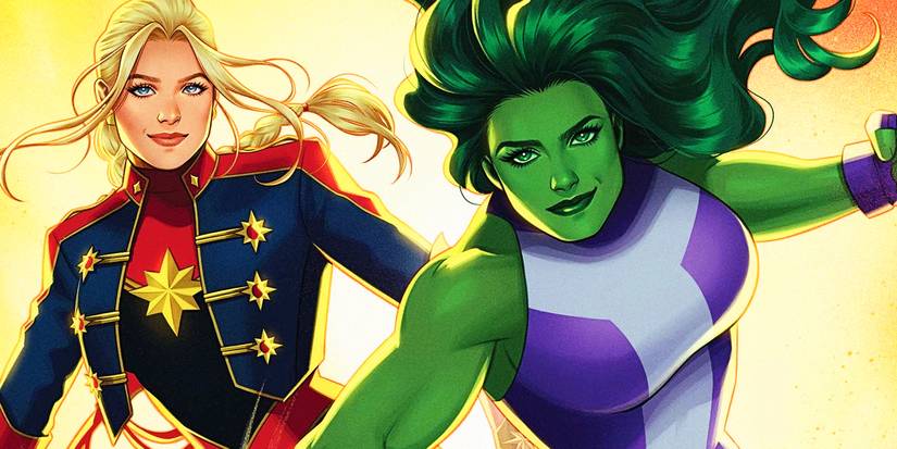 She-Hulk and Captain marvel stand shoulder-to-shoulder, posed heroically and smiling at the viewer, ready for action.
