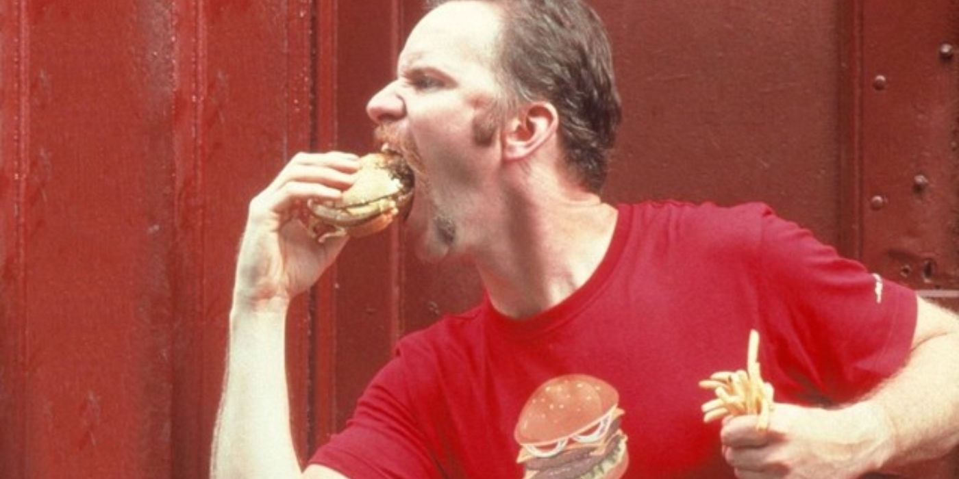 Morgan Spurlock comendo um hambúrguer em Supersize Me