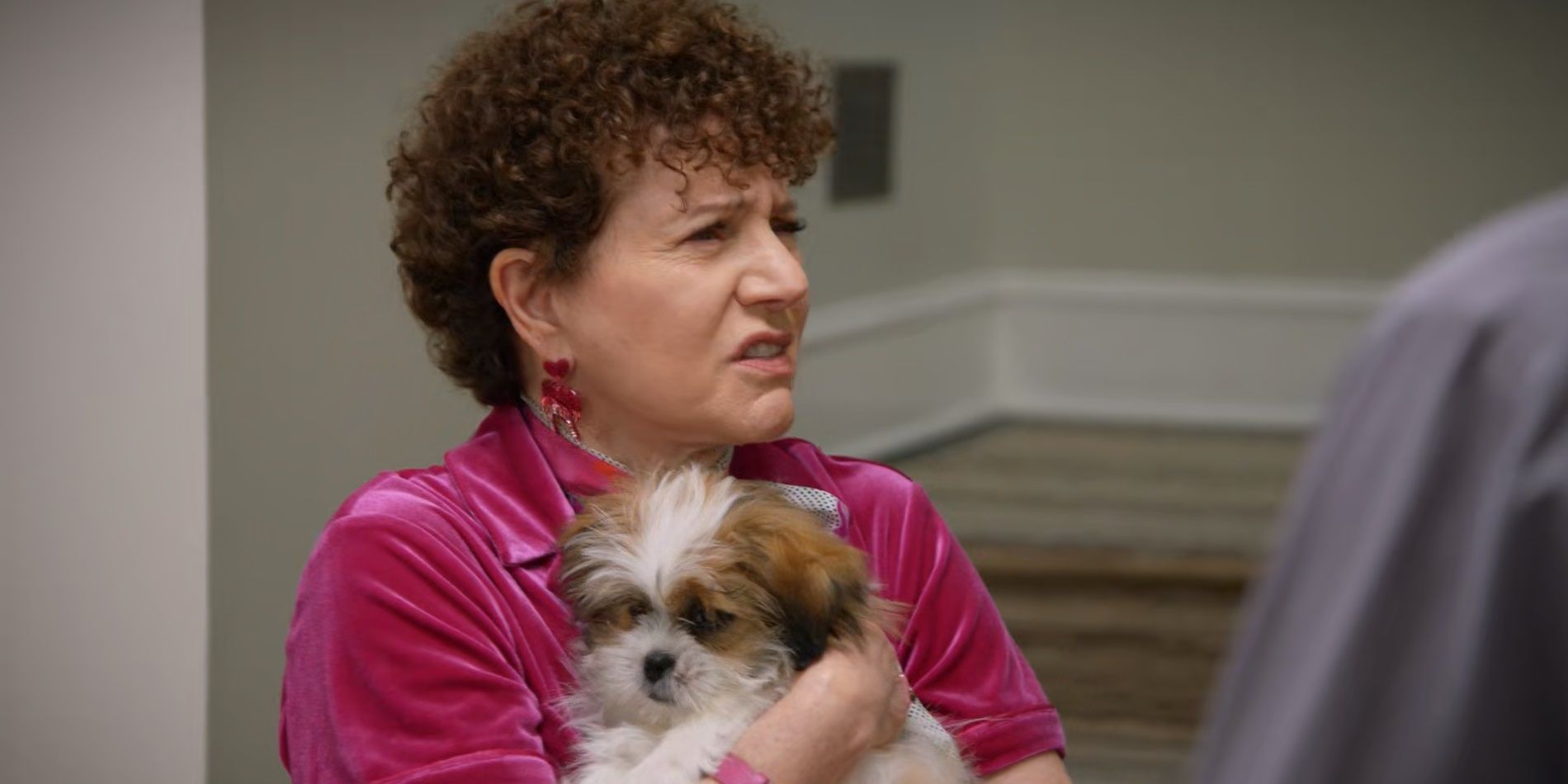Susie holding her puppy in Curb Your Enthusiasm