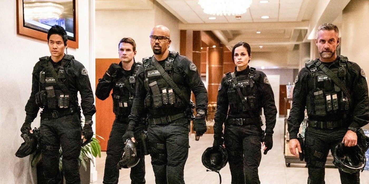 SWAT characters walking through a hallway