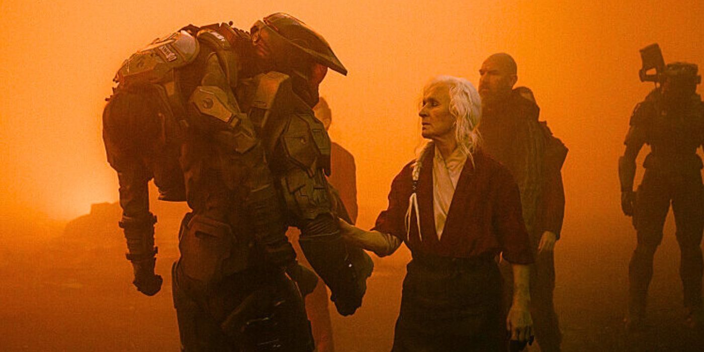 A Mãe (Olwen Fouéré) no Santuário com Master Chief (Pablo Schreiber) e Coronel Perez (Cristina Rodlo) na 1ª temporada de Halo, episódio 1