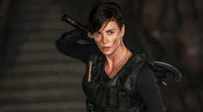 Andy (Charlize Theron) grabbing an axe in The Old Guard