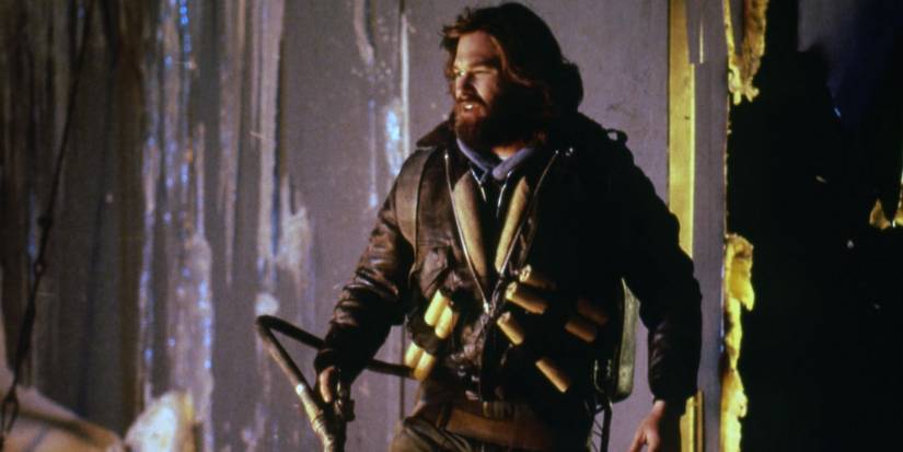 Kurt Russell as MacReady strapped with dynamite in The Thing