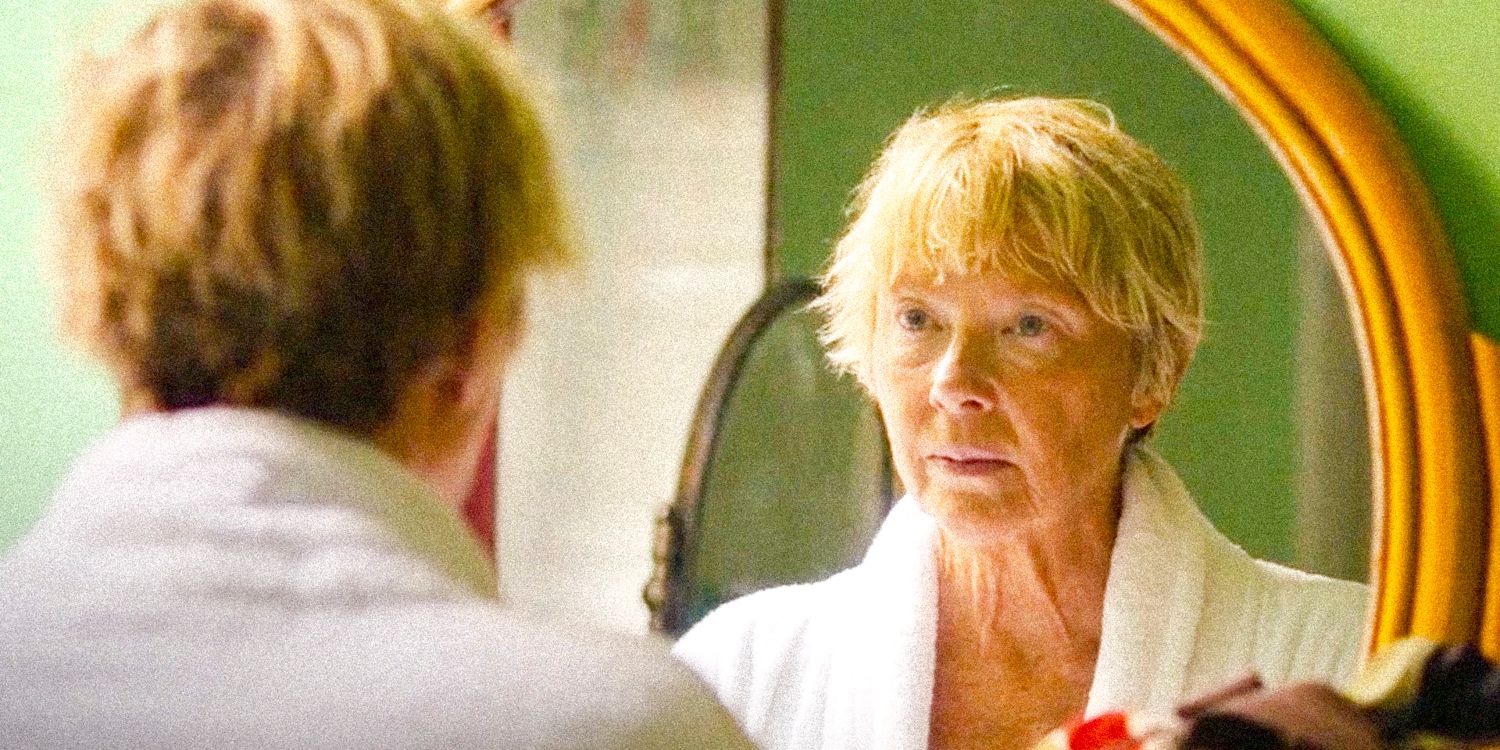 Annette Bening as Diana Nyad in Nyad looking at reflection