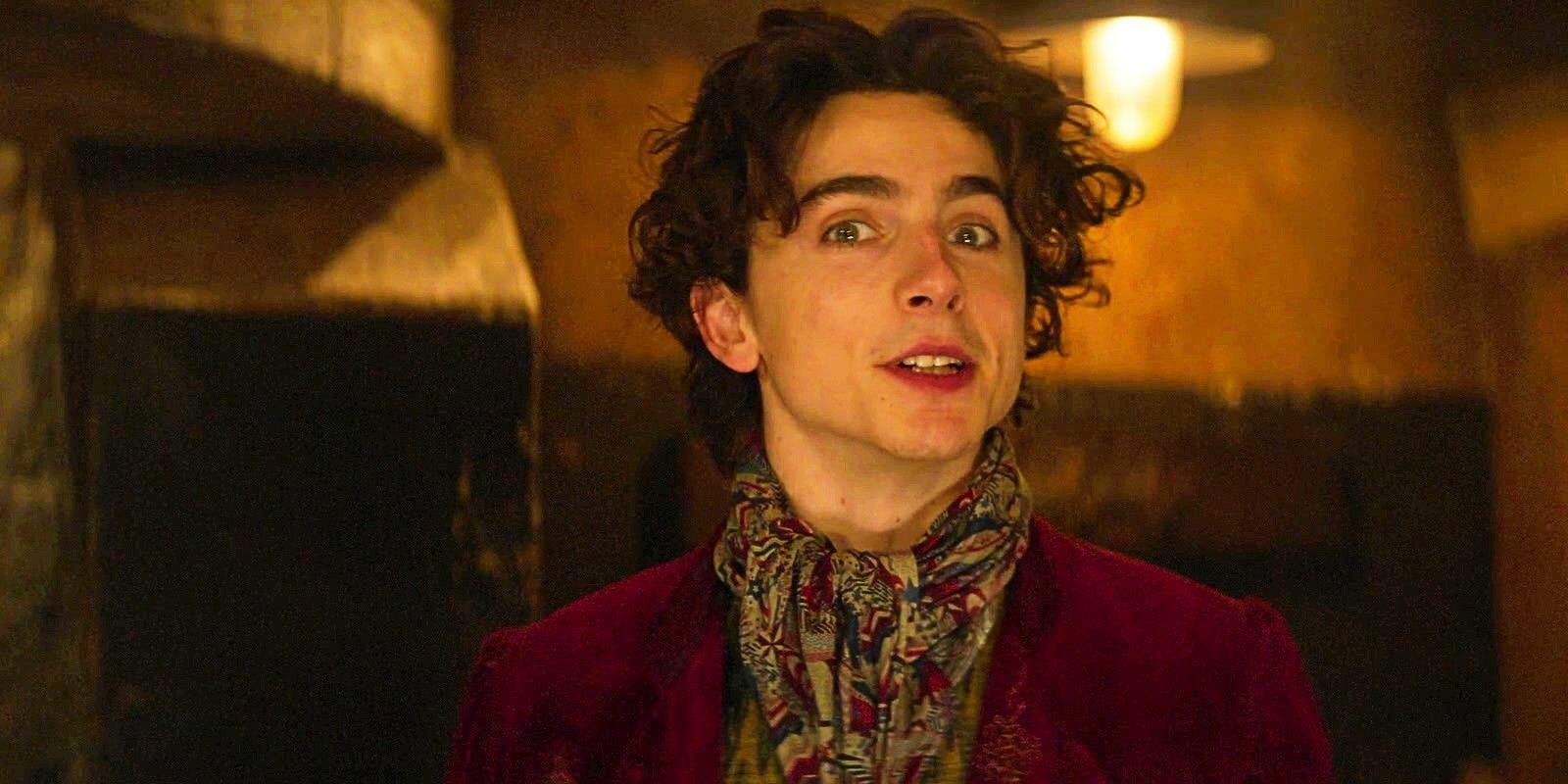 Timothee Chalamet with a slightly crazed expression as Willy Wonka in Wonka