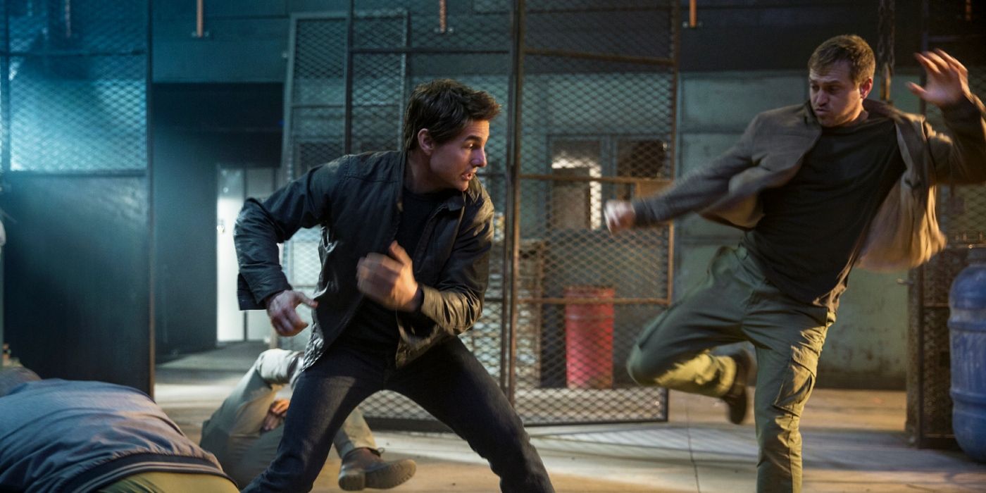 Tom Cruise preparing to block a kick as Jack Reacher in Jack Reacher: Never Go Back