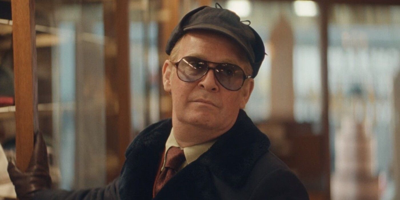 Tom Hollander As Truman Capote Wearing A Hat & Gloves In Feud: Capote vs The Swans.jpg