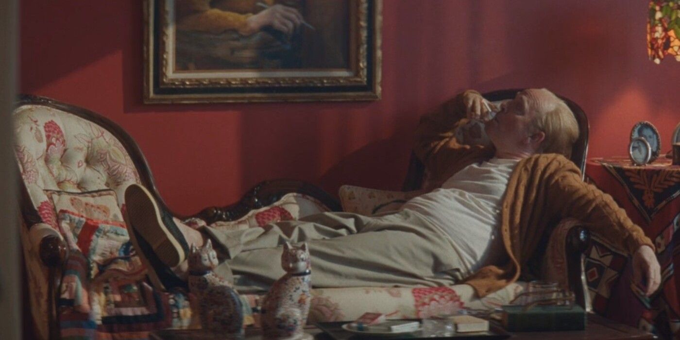 Truman Capote Lying On Couch Smoking In Feud: Capote Vs. The Swans.jpg