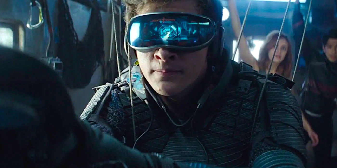 Tye Sheridan plays with a VR headset while Olivia Cooke and Win Morisaki in a scene from Ready Player One