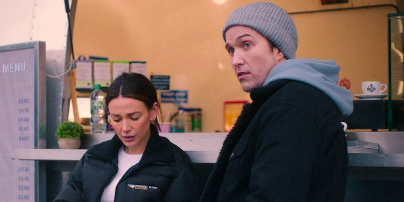 Michelle Keegan standing next to a man in Fool Me Once