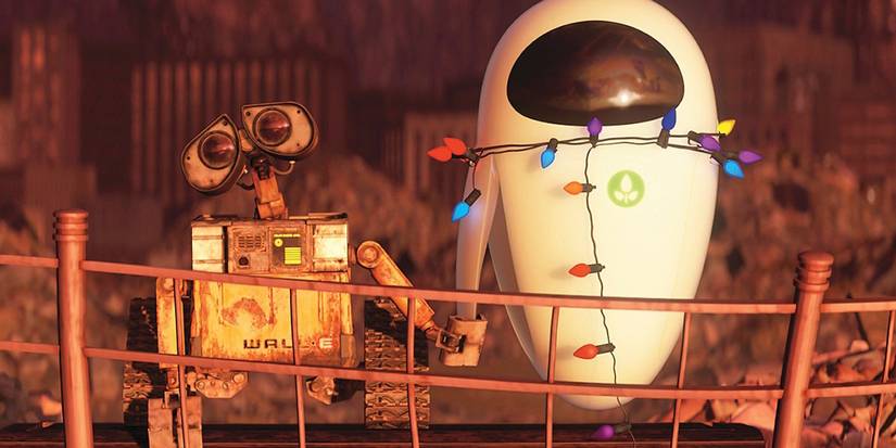 WALL-E holding Eve's hand with fairy lights wrapped around her in Pixar's WALL-E