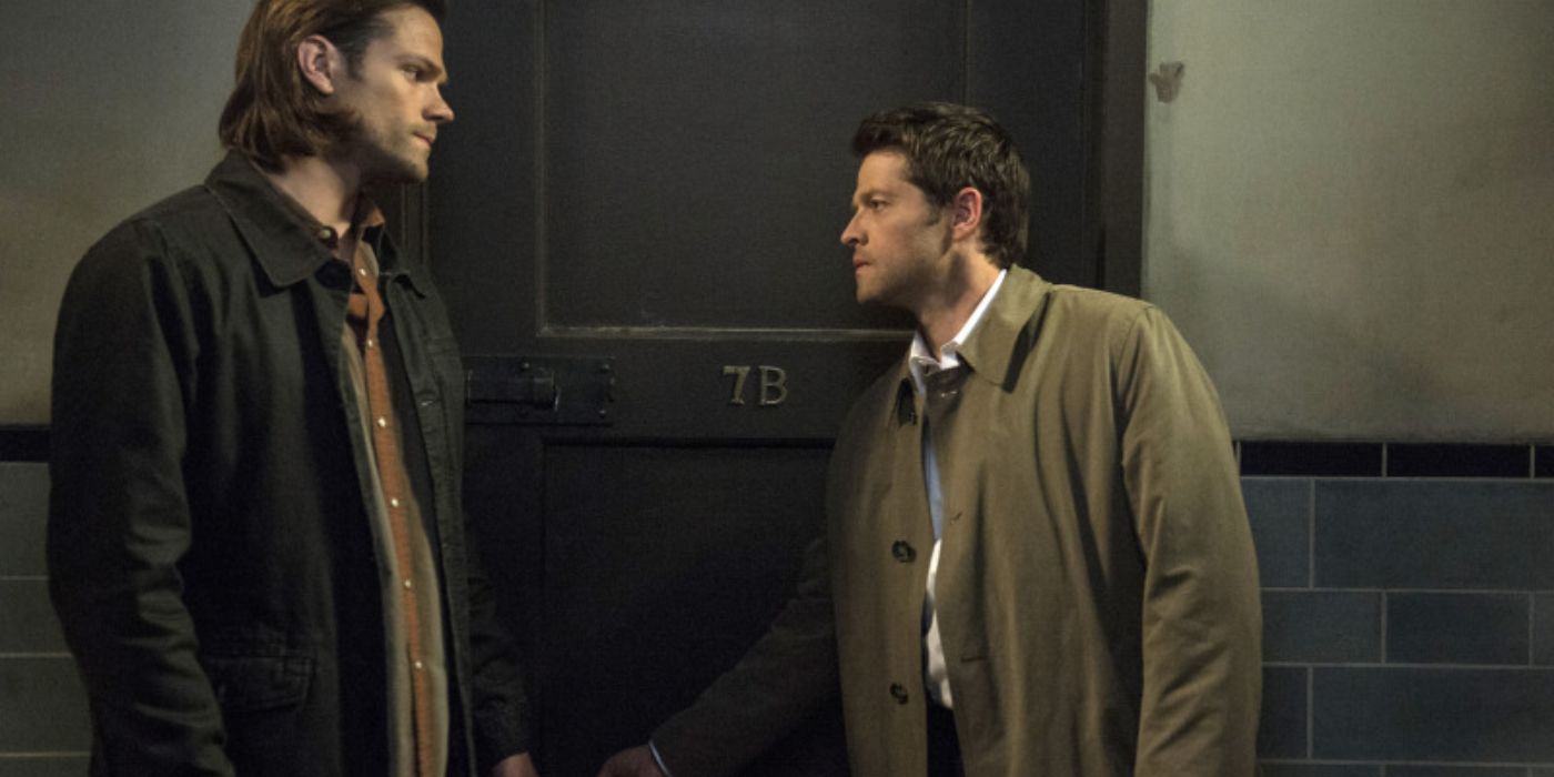 Misha Collins as Castiel and Jared Padalecki as Sam Winchester in Supernatural looking tense during a conversation