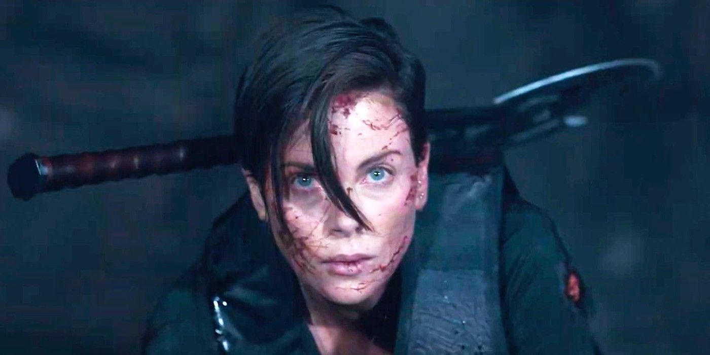 Charlize Theron with blood on her face in The Old Guard