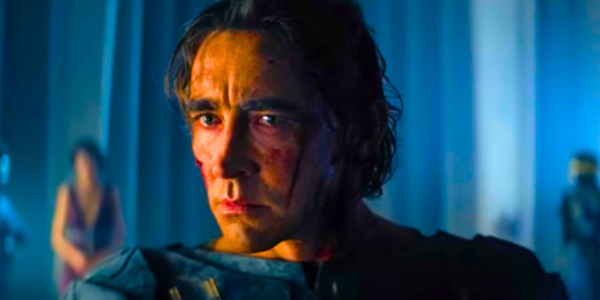 Lee Pace as Brother Day with blood on his face looking slightly scared in Foundation