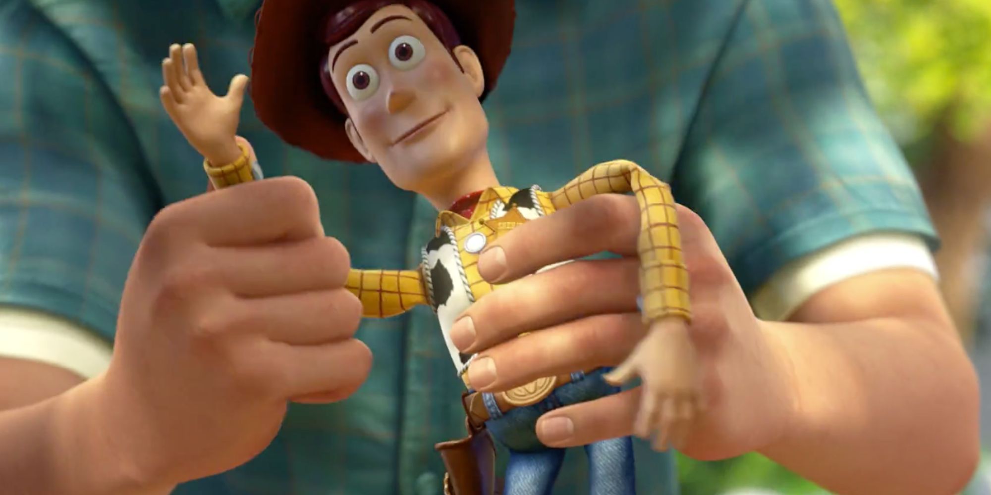 Woody being made to wave goodbye by Andy in Toy Story 3