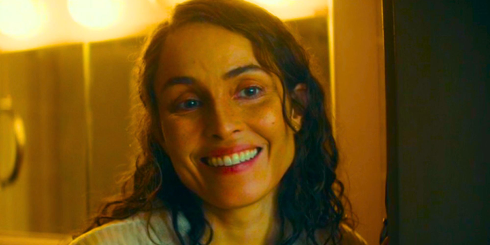 Noomi Rapace smiling as Jo in Consellation