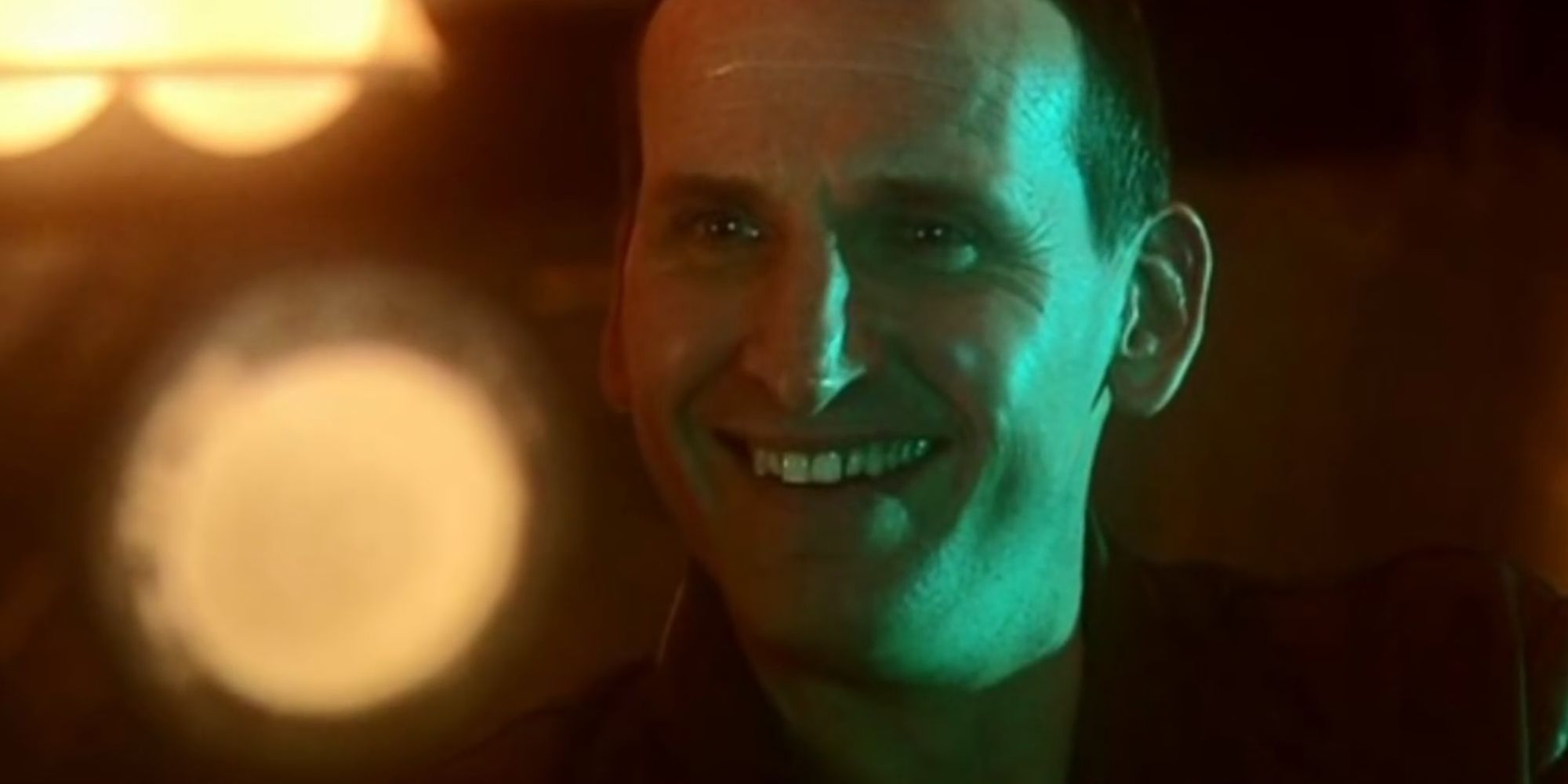 Christopher Eccleston smiling as the Ninth Doctor in Doctor Who