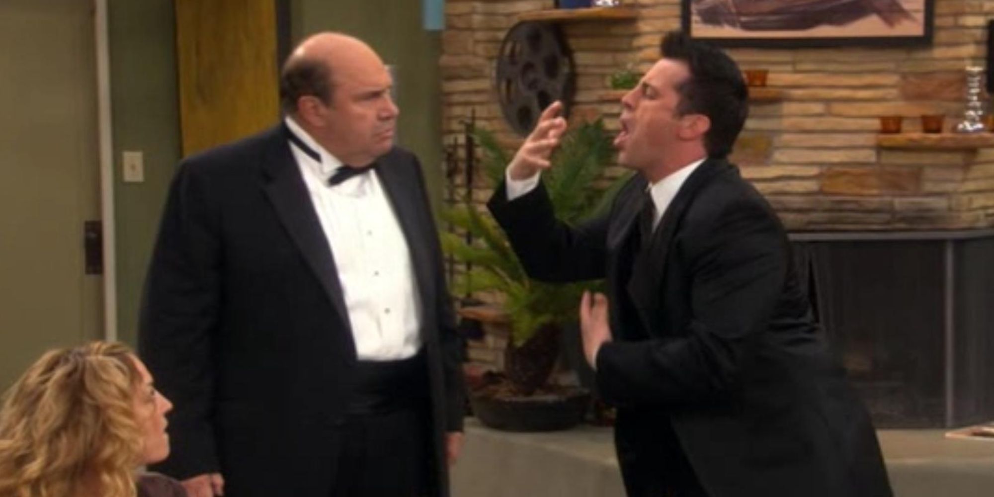 Robert Costanzo as Joey's Dad and Matt LeBlanc as Joey Tribbiani with both men arguing in suits in Joey