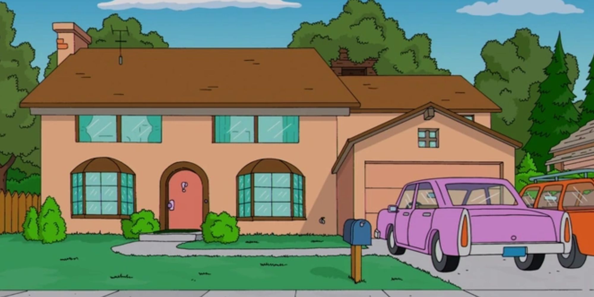 An exterior shot of the Simpsons' family home with their two cars parked outside