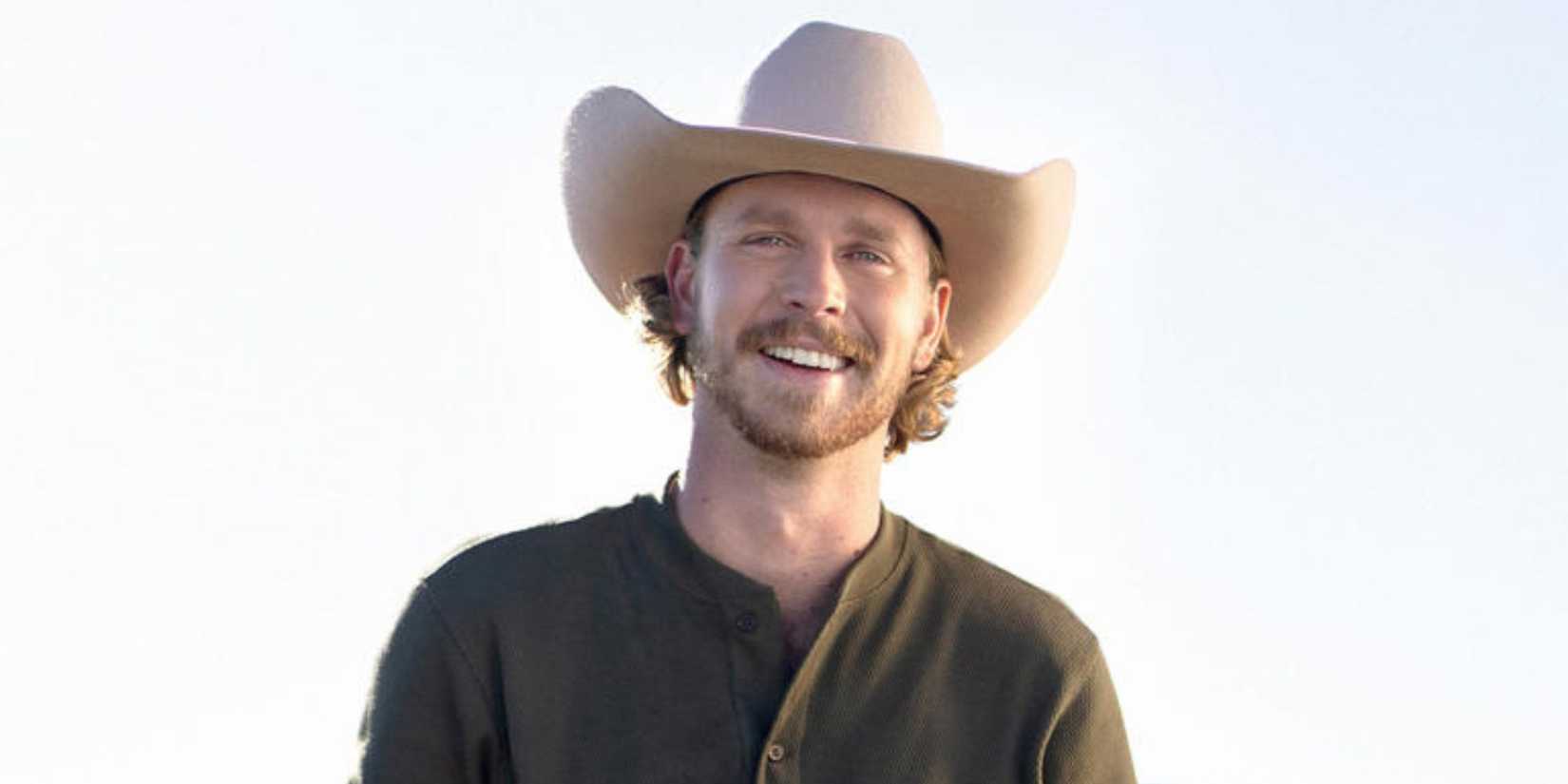 Farmer Wants A wife's Nathan Smothers smiling outside