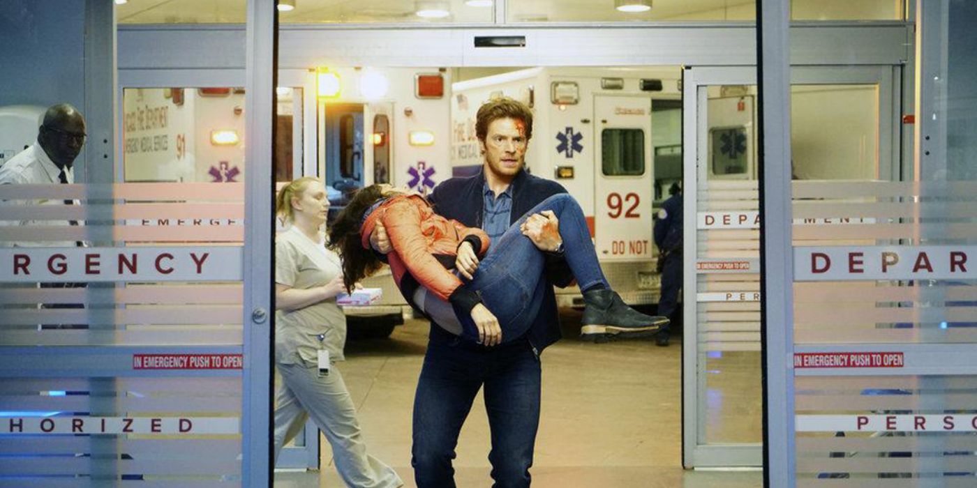 Will (Nick Gehlfuss) running into the ER holding Natalie (Torrey DeVitto) after the car accident in Chicago Med.